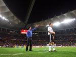 Técnico e jogador da Alemanha, em jogo no estádio Moses Mabhida